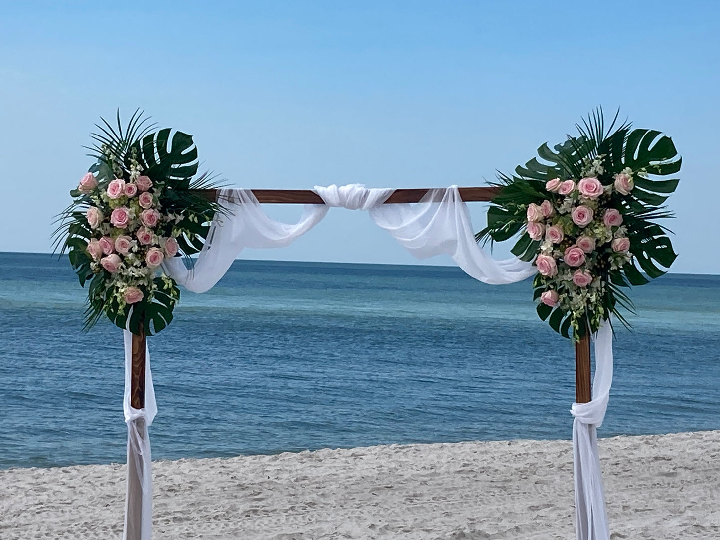 A Beautiful Wedding Arch-Roses, Hydrangia & Monstera