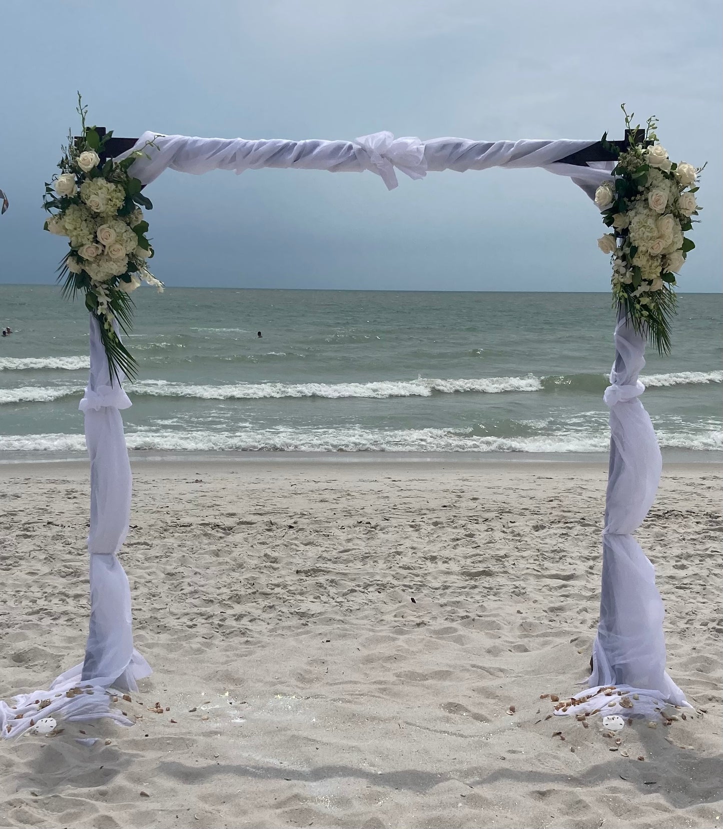 Arch w/ white florals (25 mph Winds)